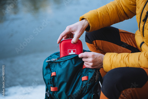 First aid kit for traveler, compact size, hiking first aid kit that is convenient to take with you in your backpack. photo