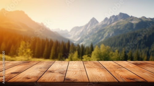 Wooden table background of free space for your decoration and blurred background of camping in mountains.