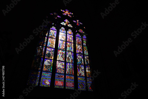 Colorful window of St. Vitus Cathedral in Prague photo