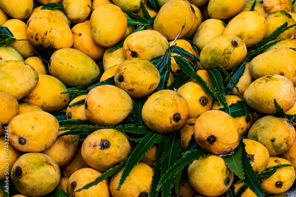 group of mangos in market 
