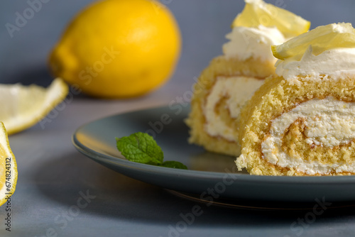 Lemon roll with fruit curd, with mint, close-up