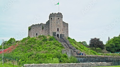 Tourists visit Cardiff Castle in Cardiff, Wales. Wales' leading heritage attraction in 4K. photo