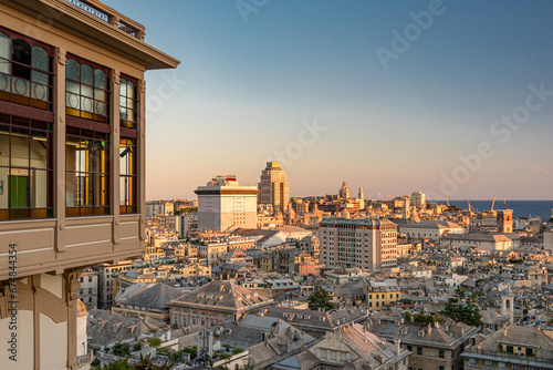 Aerial view of the downtown of Genoa at the sunset seen from Castelletto with famous public elevator