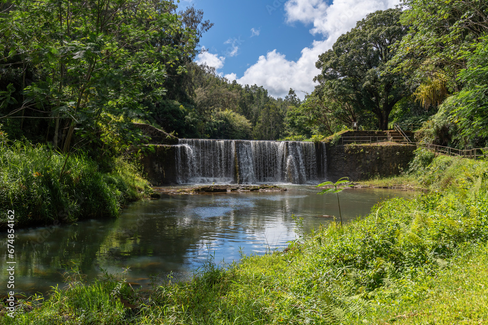 A stone dam with beautiful waterfall in Kauai, Hawaii, United States.
