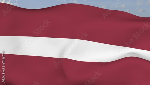 Loop der Latvia Fahne wehend im Wind als Nahaufnahme 4K