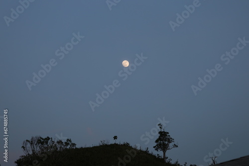 moon light during sun set