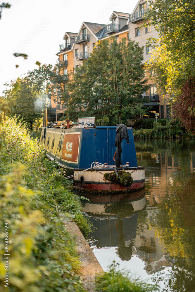 A house boat docked on Stort River in Bishop's Stortford in England A house boat docked on Stort River in Bishop's Stortford in England