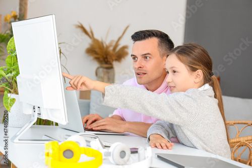 Father and daughter sitting...