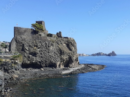 Il possente castello sul mare di Aci Castello. photo