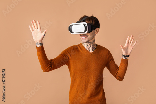 Smiling man wearing virtual...