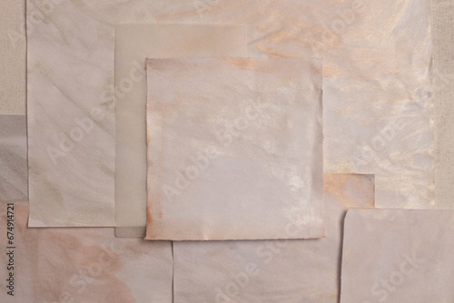 Beige and  nacre Gold paper painting empty wall. Abstract texture copy space relief background.