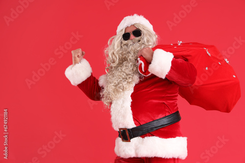 Cool Santa Claus with bag o...