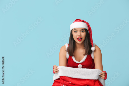 Surprised young woman dress...