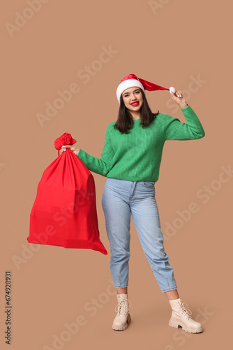 Smiling young woman in sant...