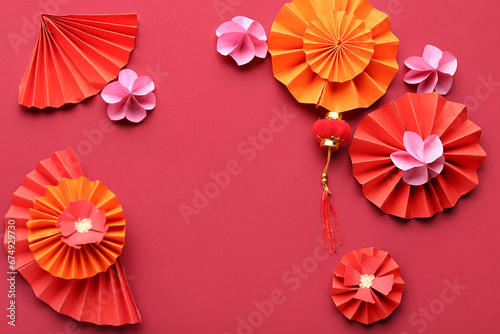 Fans with paper flowers and...
