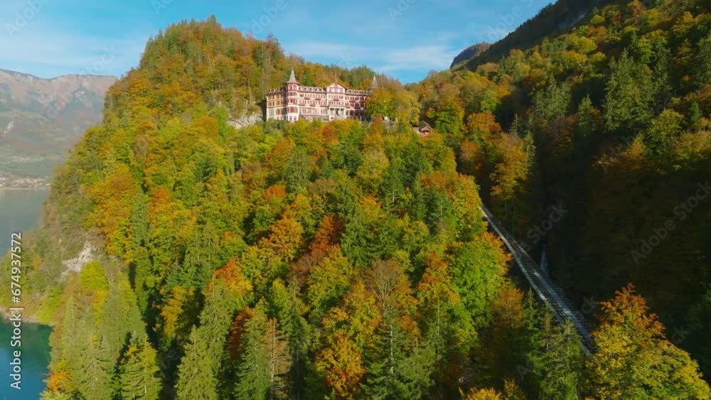 Aerial view of Giessbach Falls on Lake Brienz in Switzerland in autumn. In the background the Grand Hotel. Aerial view of Giessbach Falls on Lake Brienz in Switzerland in autumn. In the background the Grand Hotel.
