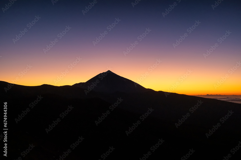 Abstract silhouette of El Teide volcano at twilight on Tenerife Island, Spain