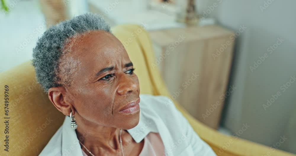 Thinking, nostalgia and sad senior black woman in a chair with memory or depression at nursing home. Remember, face and elderly African lady person in living room with dementia, Alzheimer or lonely Thinking, nostalgia and sad senior black woman in a chair with memory or depression at nursing home. Remember, face and elderly African lady person in living room with dementia, Alzheimer or lonely