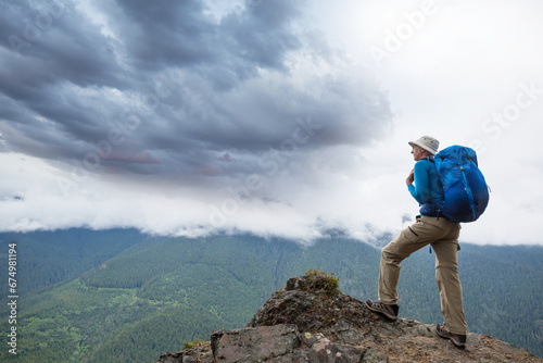 Man on the cliff photo