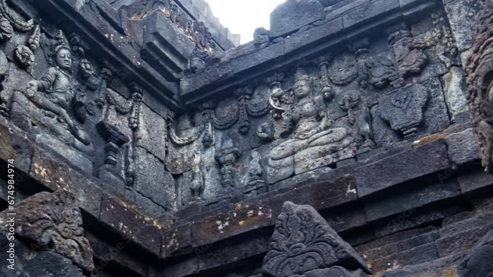 Ornament details and sculptures on the walls of the Buddhist temple Borobudur in Indonesia Ornament details and sculptures on the walls of the Buddhist temple Borobudur in Indonesia
