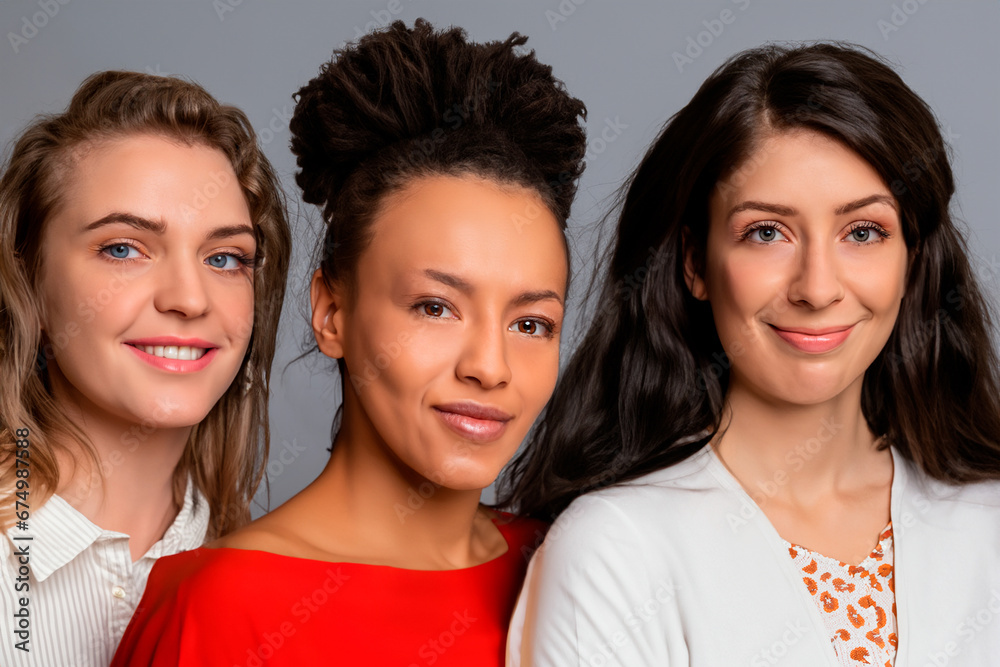 Portrait of three women of different skin colours Portrait of three women of different skin colours