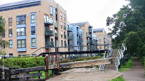 Footbridge with buildings in the background, Apsley, England
