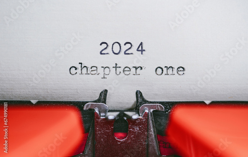 Old Typewriter with following text on paper - 2024 Chapter one. new years concept photo
