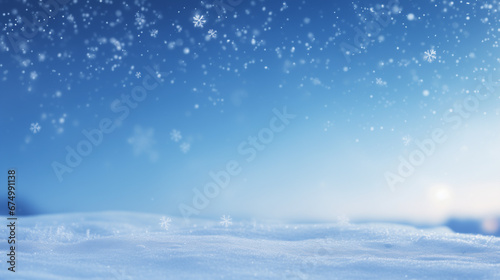Winter snow background during the sunset. Wonderful light blue sky and snowflakes falling, banner format, copy space © Laura