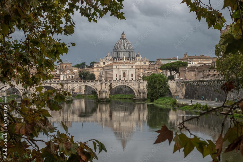 Historic bridge spanning a serene river near Vatican City Historic bridge spanning a serene river near Vatican City