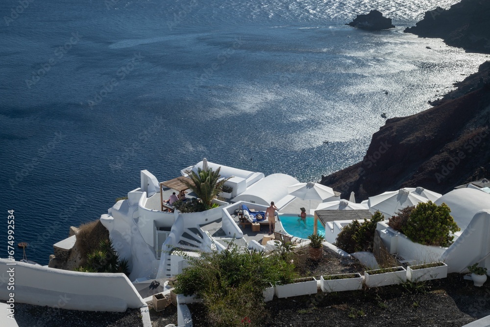 Fototapeta premium View of Santorini, Greece, showcasing the picturesque, white-washed buildings