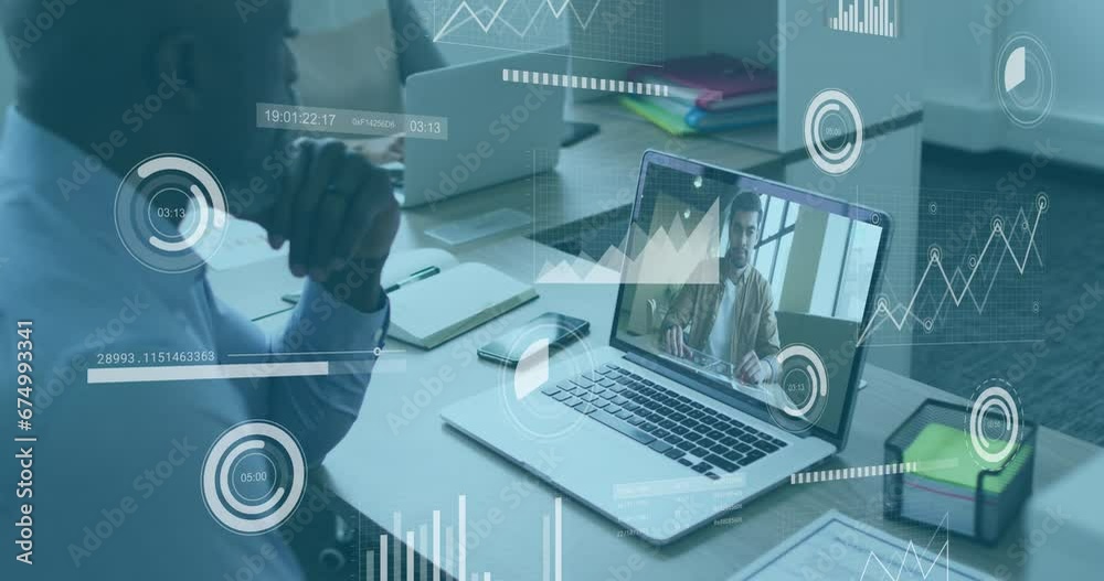 Animation of data processing against african american man having a video call on laptop at office Animation of data processing against african american man having a video call on laptop at office