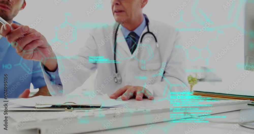 Animation of data processing on diverse senior male doctor health worker discussing over xray report Animation of data processing on diverse senior male doctor health worker discussing over xray report