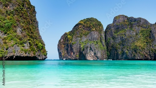 Ccenic view of pure blue sea, boats and distant mountains, Phuket and Phi Phi Island, Thailand