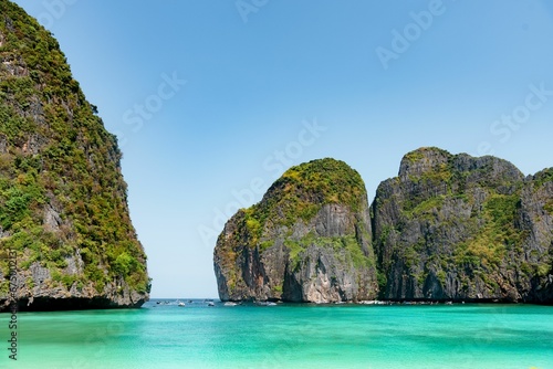 Ccenic view of pure blue sea, boats and distant mountains, Phuket and Phi Phi Island, Thailand
