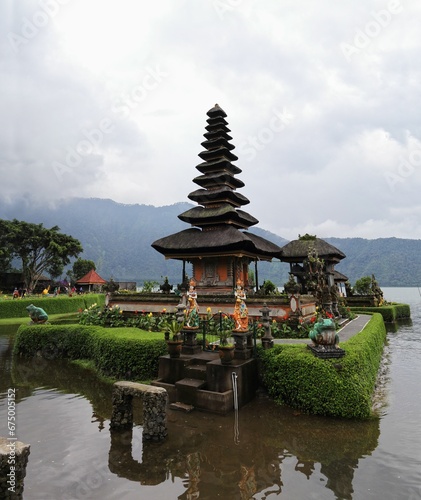 Scenic view of a temple situated in the middle of a tranquil lake in Bali, Indonesia