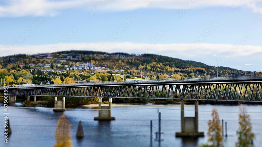 Fototapeta premium Fetsund bridge, Norway with mountains and the city on the background