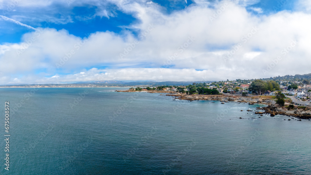 drone view of Monterey Bay, California with city and ocean