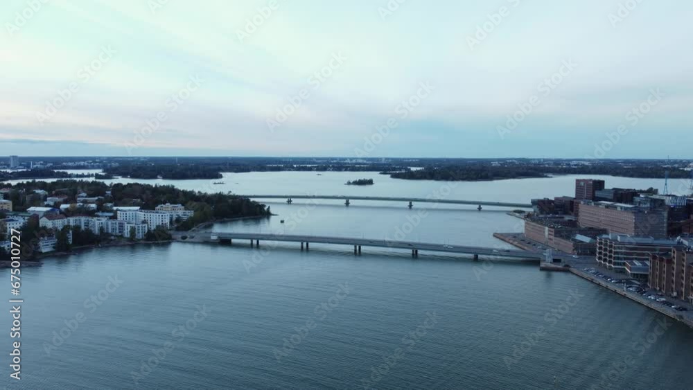 Evening blue hour aerial: Two traffic bridges in Baltic city, Helsinki Evening blue hour aerial: Two traffic bridges in Baltic city, Helsinki