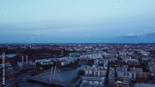 Evening blue light aerial over Baltic city Helsinki, Crusell Bridge photo