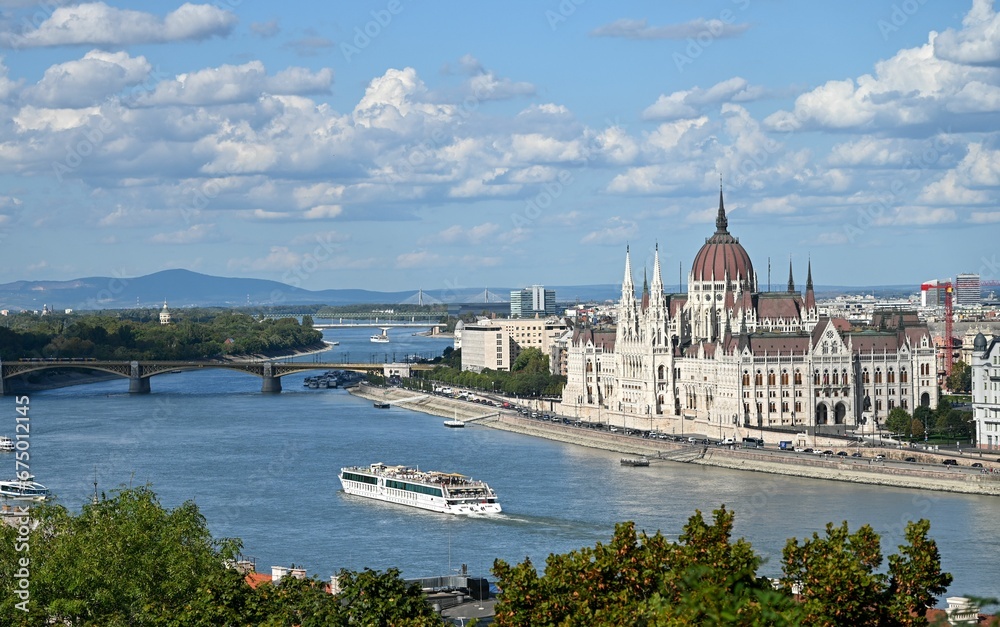 Hungarian Parliament Building, with beautiful Duna river view with blue sky