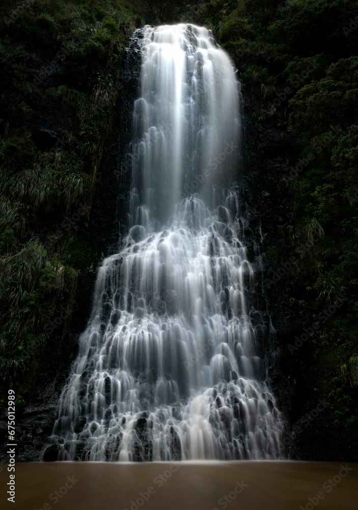 Obraz premium Karekare waterfall, near Auckland New Zealand