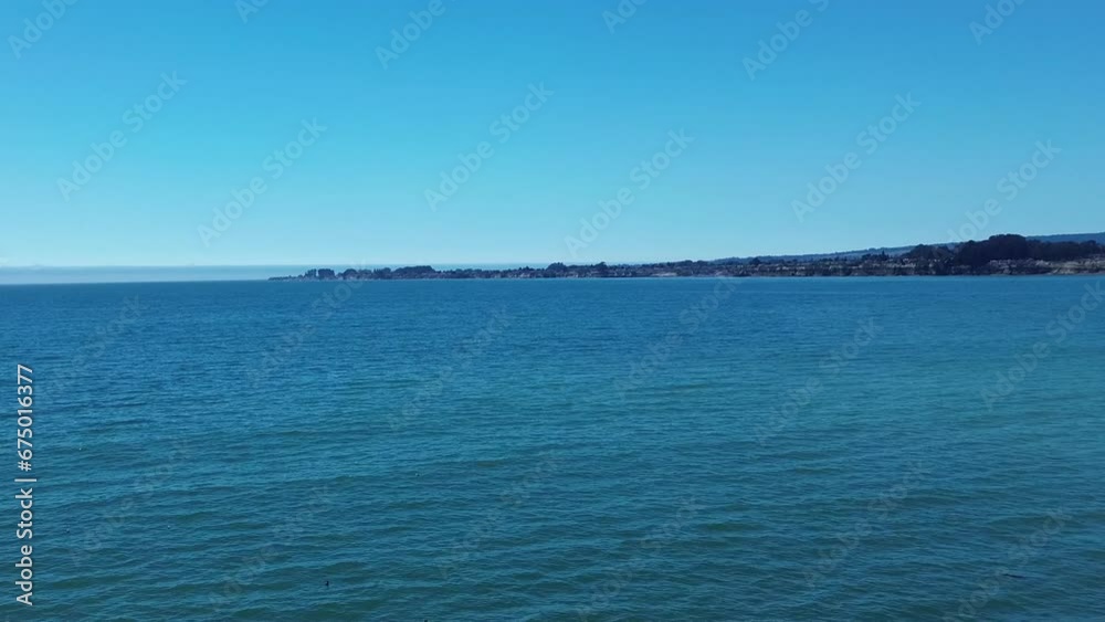 Aerial video of birds on the remains of a sunken ship in the sea near the shore Aerial video of birds on the remains of a sunken ship in the sea near the shore