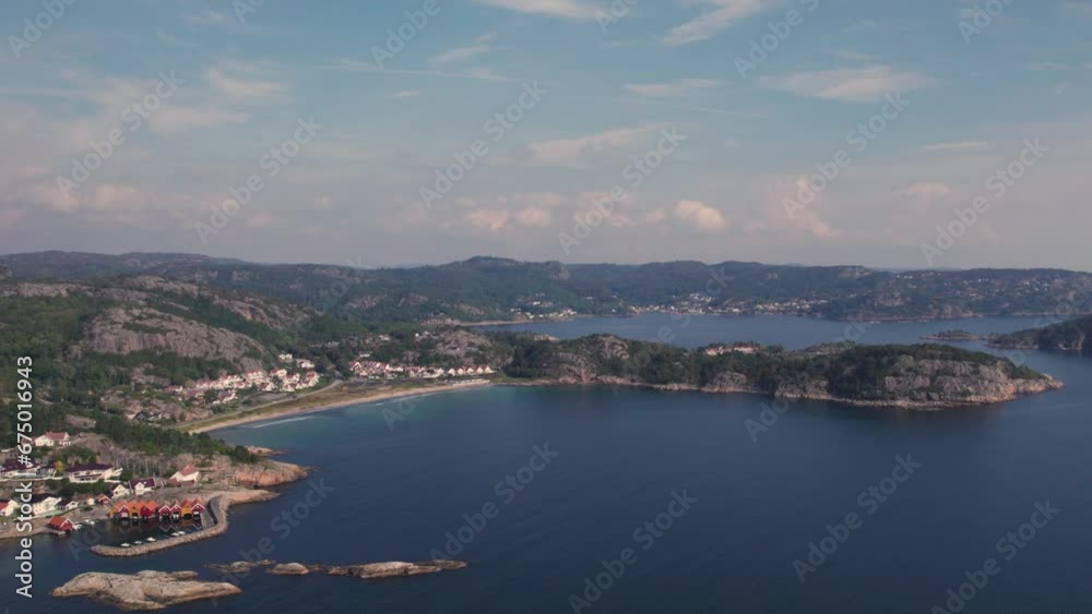 Drone shot of a beach and cabins in Spangereid, Lindesnes, South of Norway on a beautifull summer day Drone shot of a beach and cabins in Spangereid, Lindesnes, South of Norway on a beautifull summer day