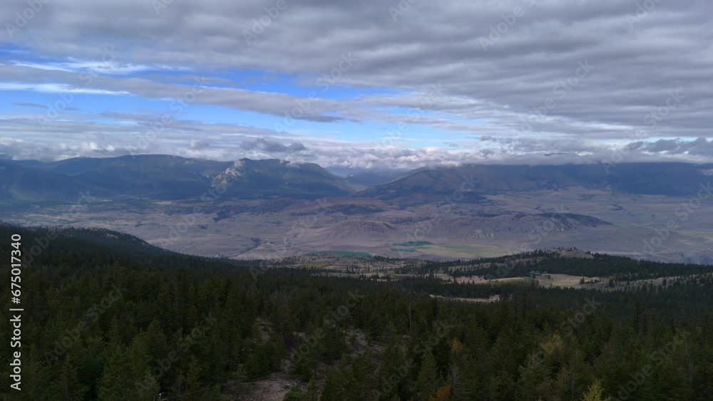 Ashcroft, British Columbia's Natural Setting from Above: Untouched Forests and Semi-Arid Desert under Cloudy Skies Ashcroft, British Columbia's Natural Setting from Above: Untouched Forests and Semi-Arid Desert under Cloudy Skies