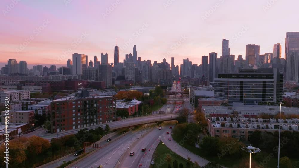 Chicago aerial view of expressway with traffic at sunrise Chicago aerial view of expressway with traffic at sunrise