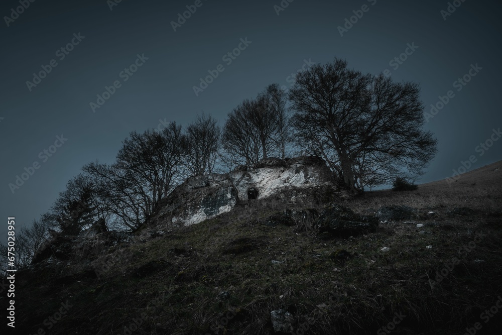 Stunning view of the rocky landscape lit by the moonlight in Germany. Stunning view of the rocky landscape lit by the moonlight in Germany.