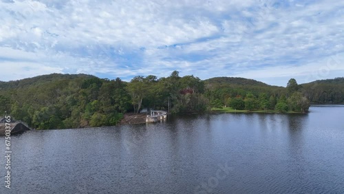 Aerial towards dam edge and lush picnic areas Lake Wappa QLD Australia photo