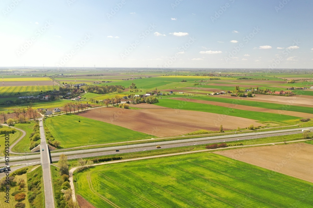 Naklejka premium Aerial view of a wide open rural landscape in the fall