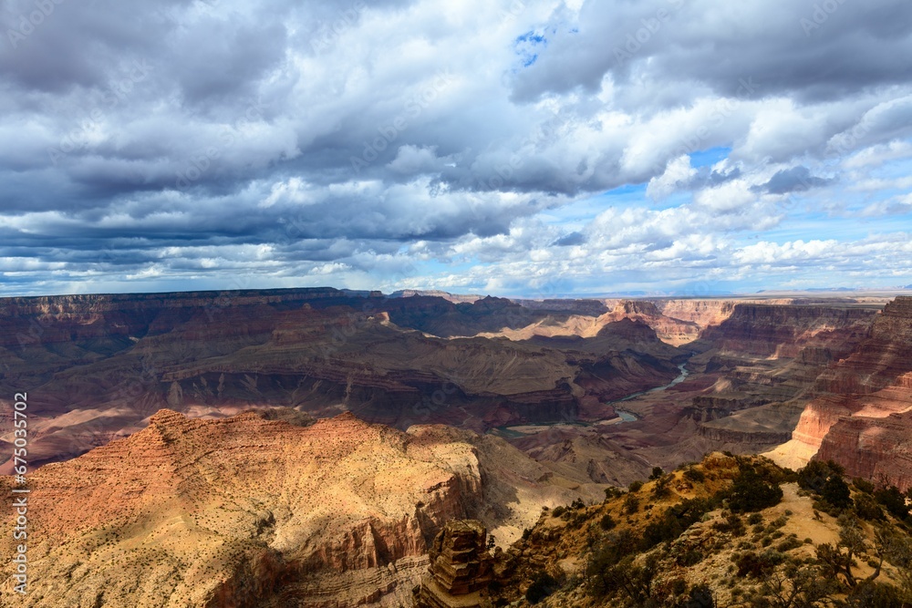 Aerial view of the South Rim of the Grand Canyon bathed in golden sunlight