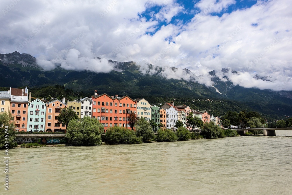 View of the colorful houses situated on the river Inn in Innsbruck, Austria.
